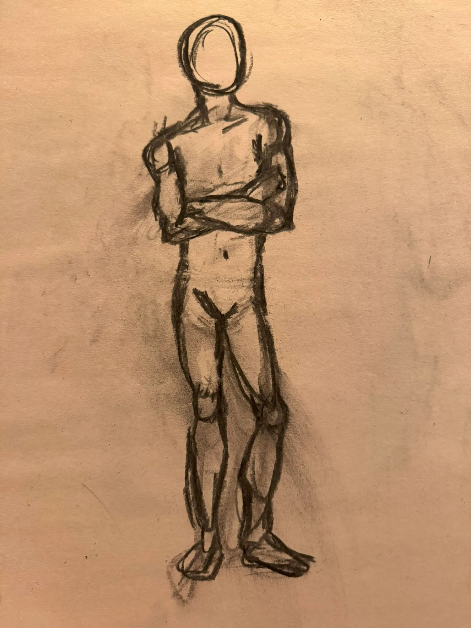 A figure drawn in charcoal