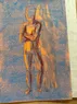 A figure on orange paper covered in blue pastel, the shadows are a dark red and the highlights show the orange paper underneath