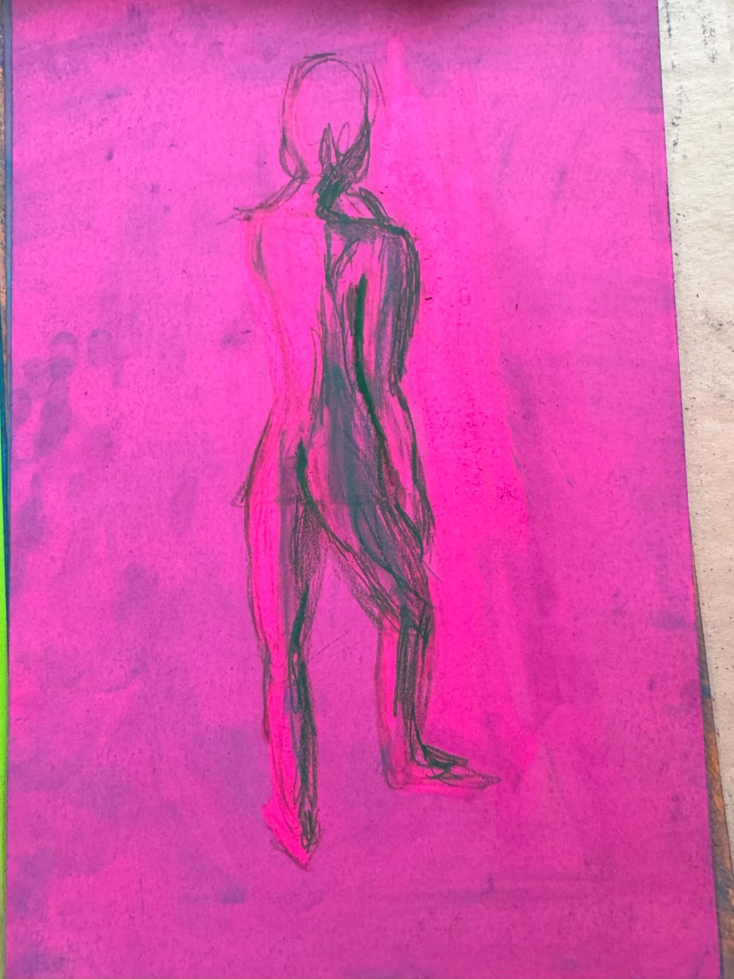 A figure on pink paper covered in darker pink pastel, the shadows are a dark greenish-gray and the highlights show the pink paper underneath