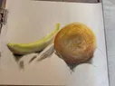 An orange and banana drawn with chalk pastels