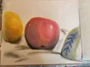 An apple with an orange and part of an overturned bowl on either side, drawn in chalk pastel