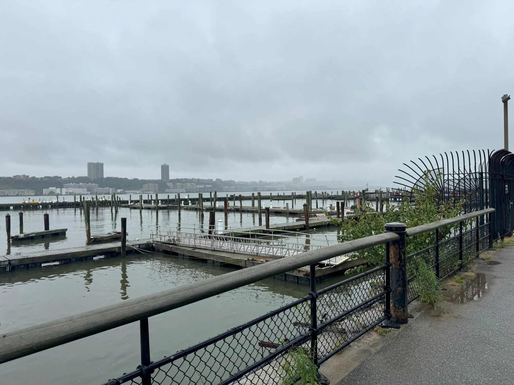 Empty docks in the river on a rainy day