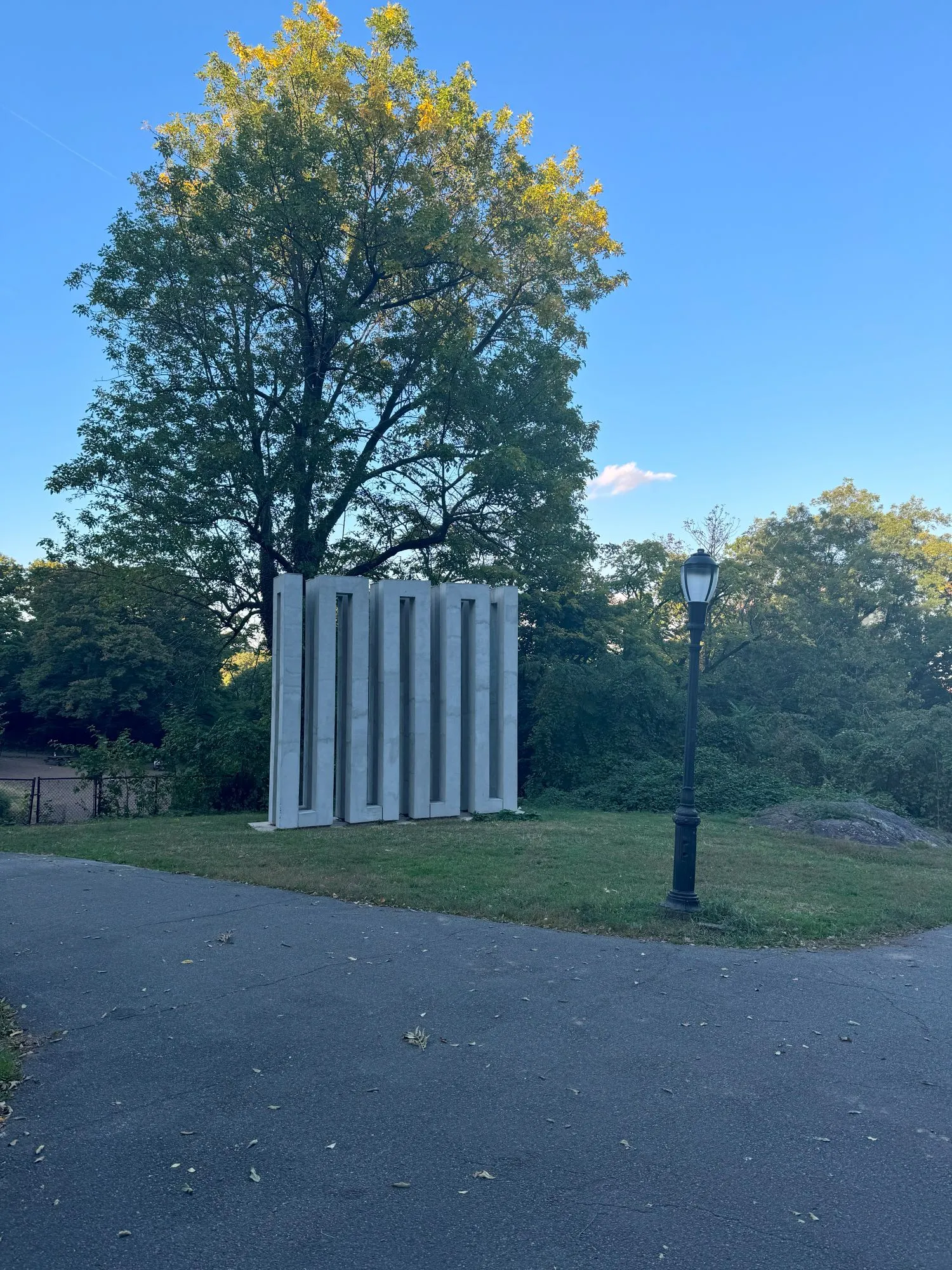 A statue in a park in a squared zigzag shape