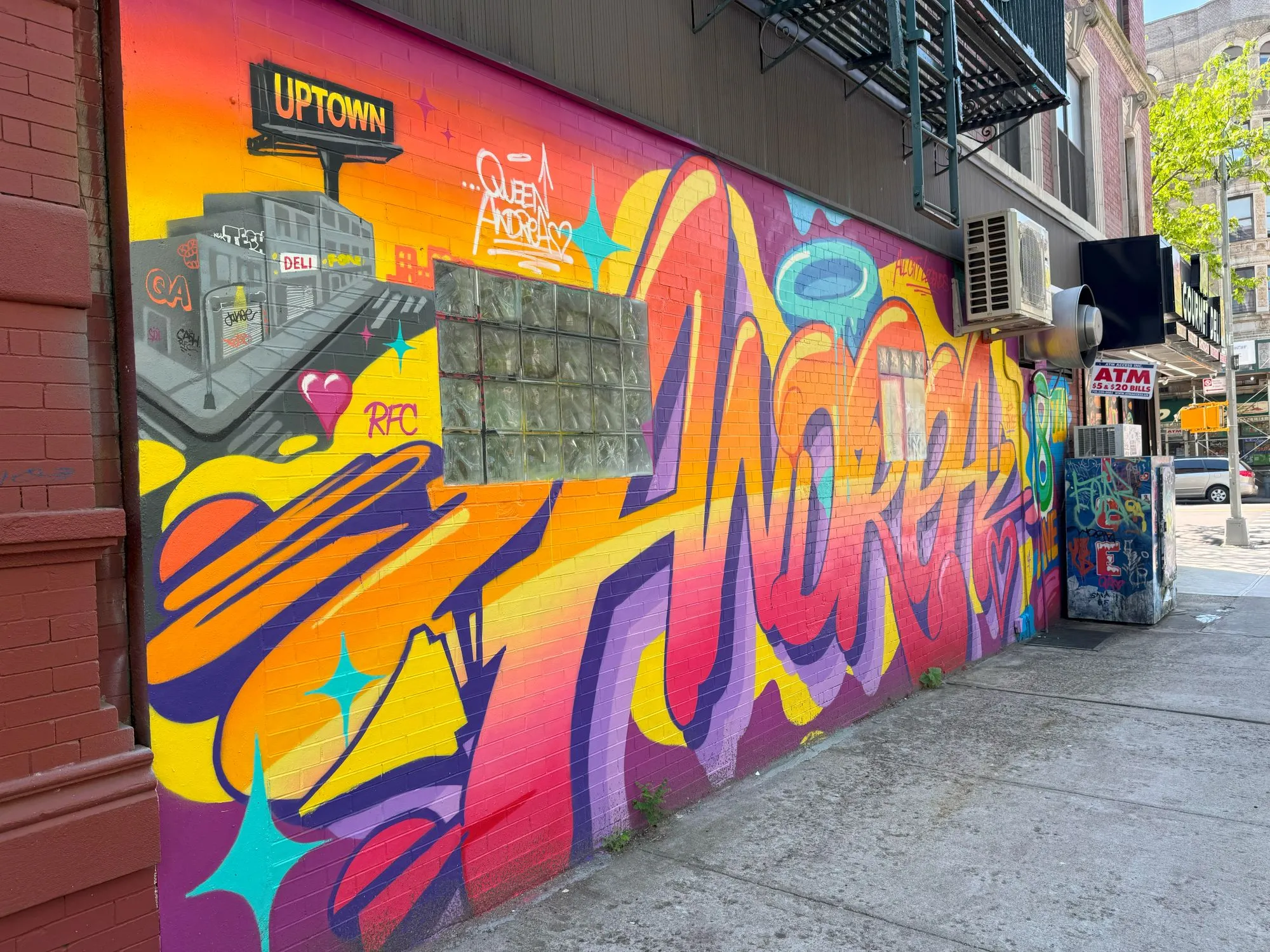 A colorful mural on the side of a building