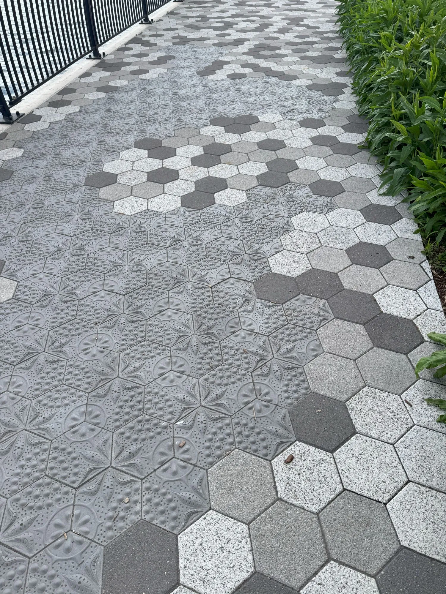 A pattern in the tiles of a walking path